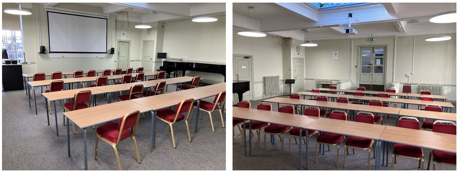 Chairs and tables in rows facing the front of the room.